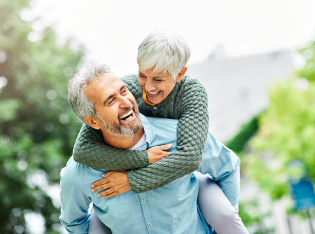 Happy elderly couple embracing